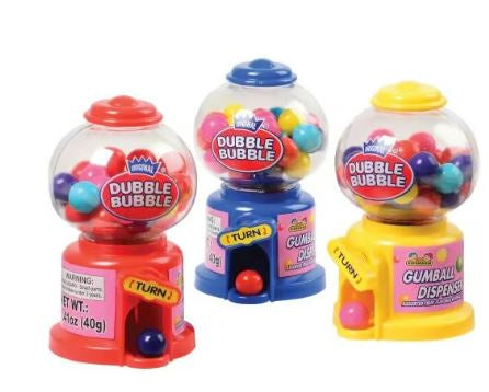 Product photograph of three Dubble Bubble toy gumball machines in red, blue, and yellow featuring clear globes filled with multi-colored candies and yellow turn labels on a white background