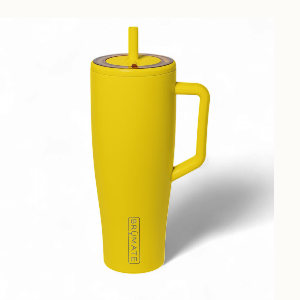 Product photograph of a BrüMate Era tumbler on a white background featuring a vibrant yellow matte finish, a large ergonomic handle, and a matching straw with a translucent lid