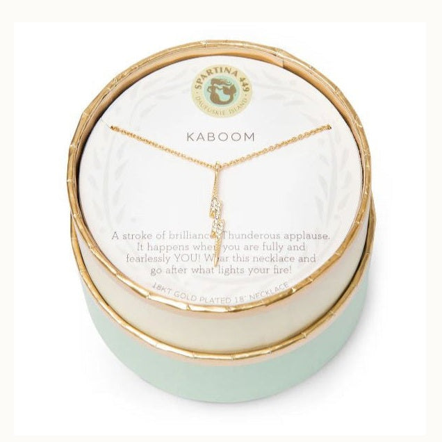 18kt gold plated necklace by Spartina 449 featuring a crystal-encrusted lightning bolt pendant displayed in a round mint-green decorative box with gold trim and the brand's mermaid logo