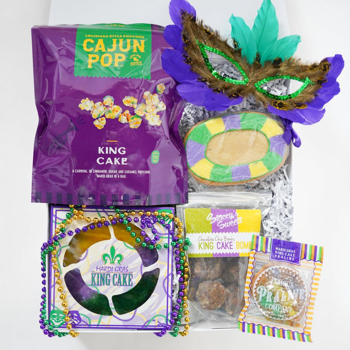 King cake packaging with decorative elements on a white background