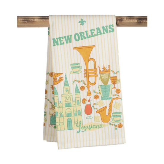 Catstudio vintage-style screen-printed cotton dish towel celebrating New Orleans, Louisiana, featuring the St. Louis Cathedral alongside a golden trumpet, a green Mardi Gras king, and a vibrant red hurricane cocktail