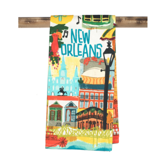 Illustrated fabric tea towel by Cat Studio featuring a colorful collage of New Orleans landmarks including St. Louis Cathedral and the Steamboat Natchez along with a vintage green streetcar and a bowl of red crawfish