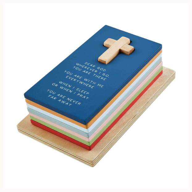 Wooden prayer block set featuring a stack of multi-colored rectangular slabs with a natural grain wooden cross and white sans-serif prayer text on a navy blue top surface