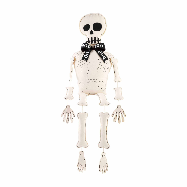 Stuffed fabric skeleton with dangling limbs and a black Boo bow tie