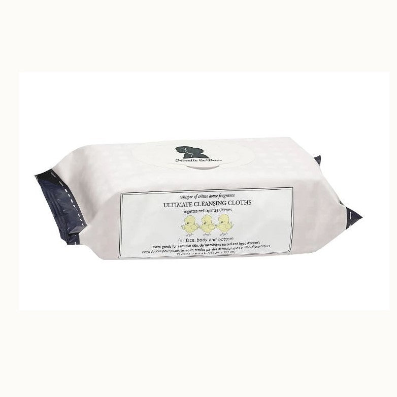 Studio product photograph of Noodle & Boo Ultimate Cleansing Cloths packaging against a plain white background featuring three illustrated yellow ducklings and a subtle white checkered pattern with dark navy side seals
