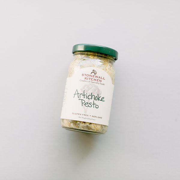 Jar of Stonewall Kitchen Artichoke Pesto with a green lid