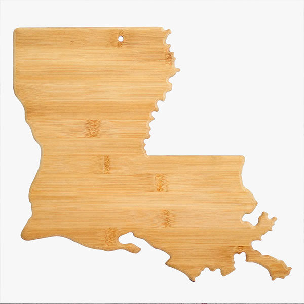 Bamboo wood cutting board shaped like the state of Louisiana featuring a horizontal grain pattern, a small hanging hole, and the intricately carved coastline of the Mississippi River delta