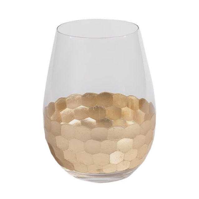 Clear glass stemless wine glass featuring a metallic gold honeycomb pattern around the lower half set against a white studio background with a reflective textured finish and a smooth clear upper rim