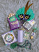 Mardi Gras feather mask and snacks with a glitter Brumate Hopsulator