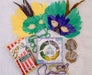 The Basketry Mardi Gras masks and beads, mini king cake, Zapp's chips, and pralines for Mardi Gras party