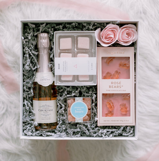 Rose champagne, exfoliating sugar cubes, and rose candies.
