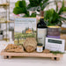 Charcuterie board with red wine and salty snacks, New Orleans gift basket, company branding