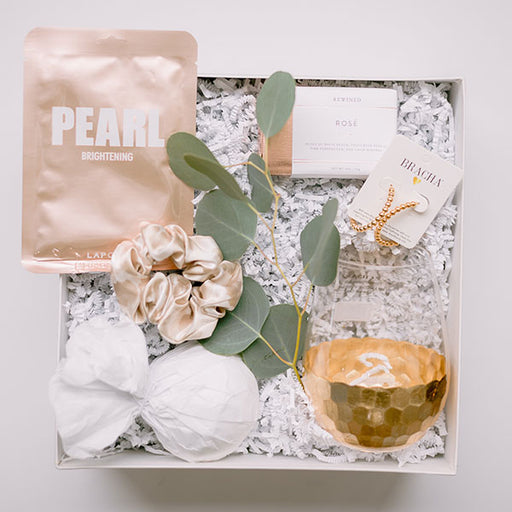 Spa gift box with Bracha jewelry and gold wine glass for bridesmaid proposal box
