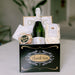 Poema champagne and salty and sweet snacks gift basket