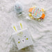Musee bath bomb, wind up bunny toy, jelly beans Easter gift The Basketry