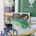 Mardi Gras gift basket with wine and cocktail book