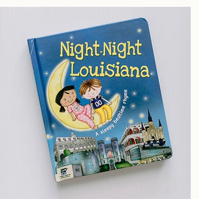 Night Night Louisiana board book cover with two children on a crescent moon above New Orleans landmarks