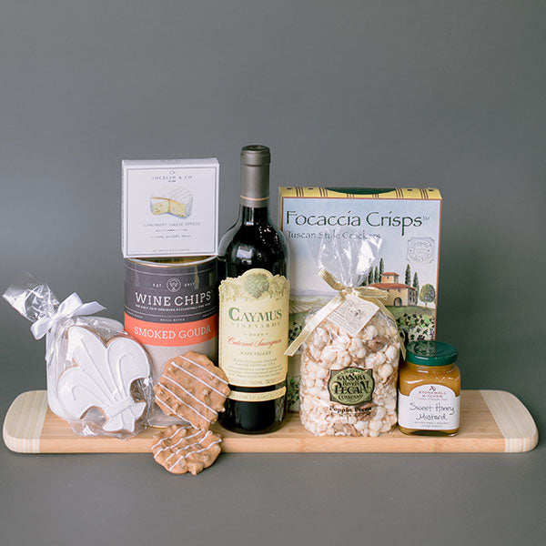 Caymus and charcuterie snacks gift basket