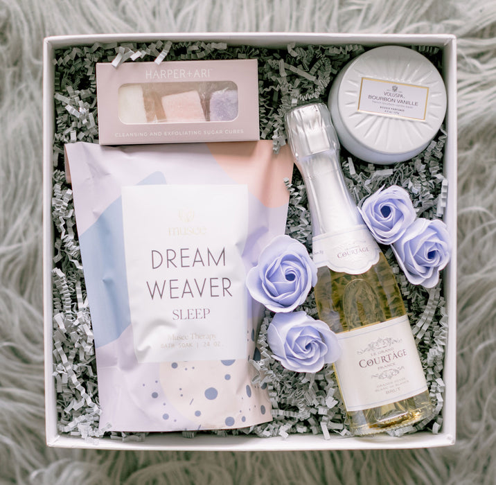 Lavender bath salts and body scrub, mini champagne, and. Voluspa candle relaxation gift box