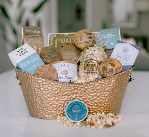 Sympathy gift basket with tea and sweet and salty snacks