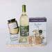 Ole Orleans white wine with charcuterie snacks on a marble board, NOLA gift basket